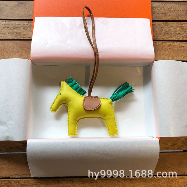 

h family leather bag sheepskin hand stitched pony car pendant