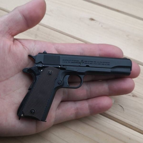 

951: 2.05 toy gun alloy empire 1911 metal model removable throwing shell can not launch boy gifts