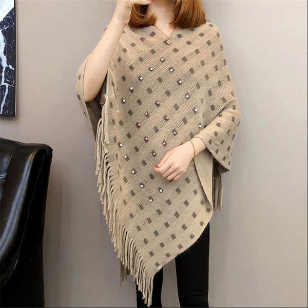 

autumn and winter knitted tassels in the long section of the shawl new loose cape coat female bat shirt, White;black