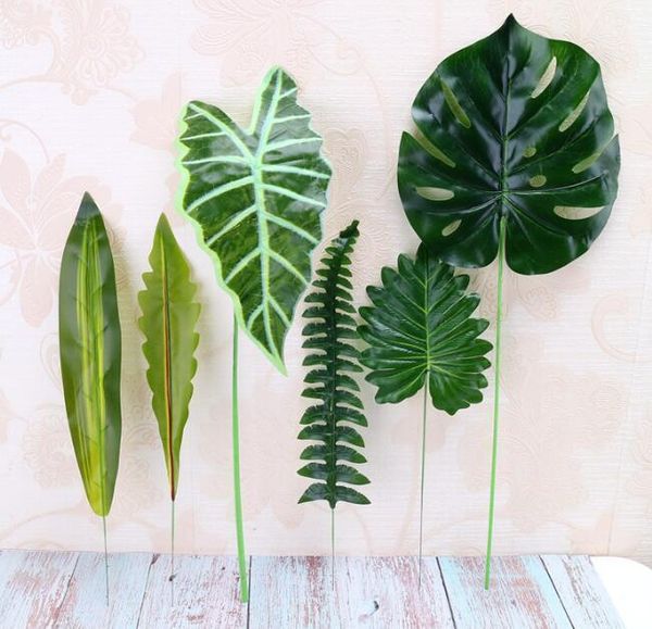 

artificial plant large artificial fake monstera palm tree leaves green plastic leaf for wedding diy table decoration1