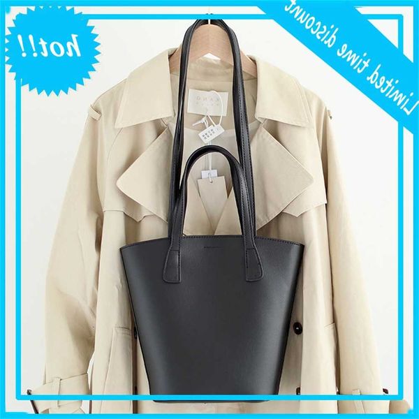 

korean version pure color hand-held women's casual versatile niche bucket bag simple fashion temperament son mother single