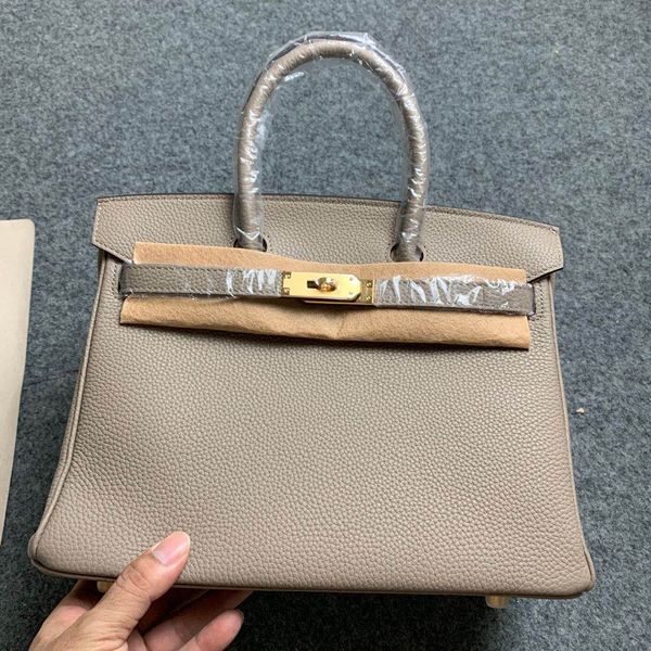 

whosale design brikiin purse size 25 30 35cm for chosen,calf skin machina made,have gold and silver hardware,contact me for details