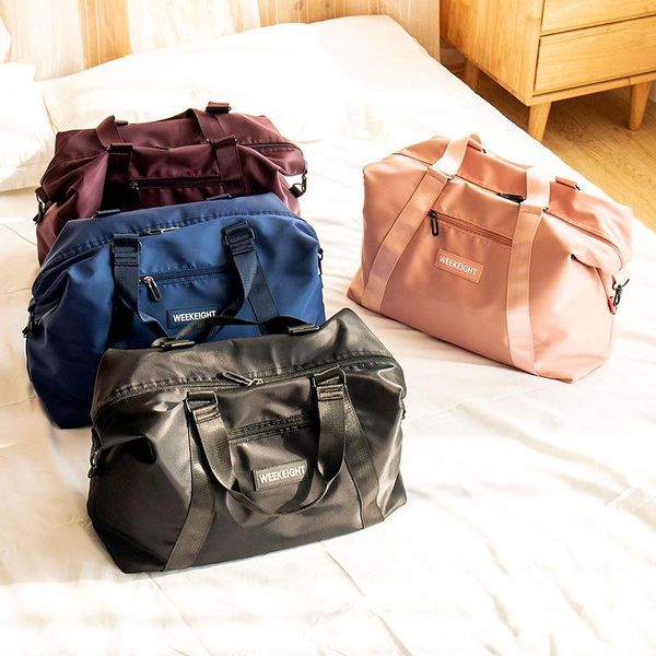 

duffel bags women's hand-held travel bag business luggage wear pull rod waterproof nylon dry wet separation