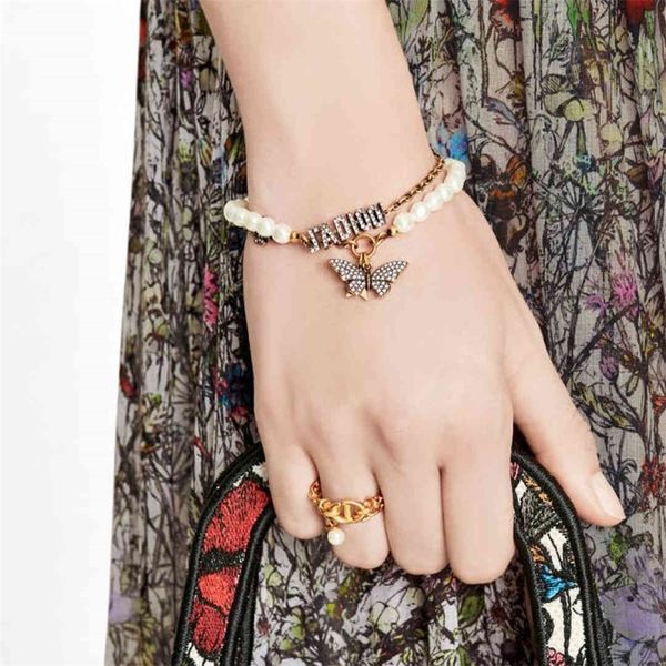 

butterfly pearl bracelet female new layer tassel, Golden;silver