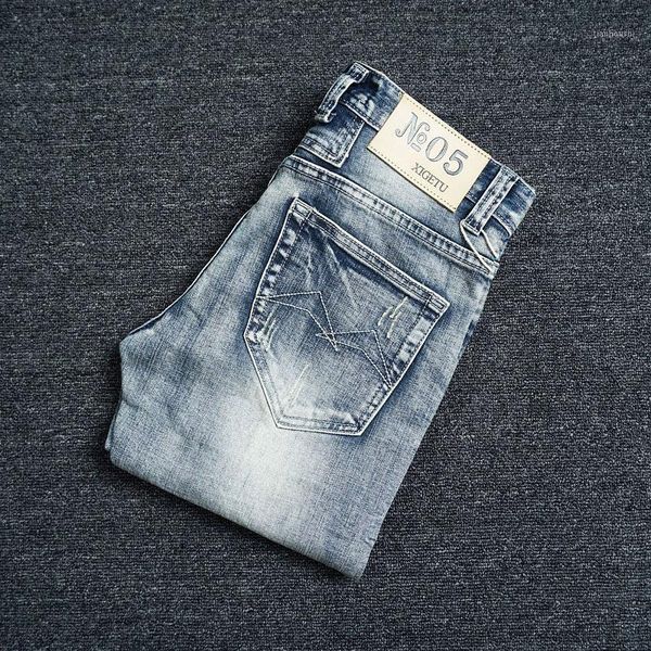 

italian vintage fashion men jeans retro light blue slim fit ripped jeans men streetwear hip hop designer homme1