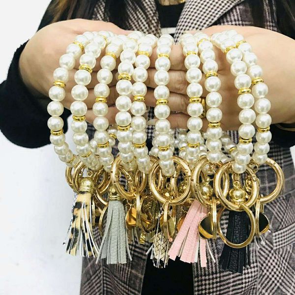 

european and american creative fashion beaded pearl bracelet pu leather tassel copper pendant keychain factory direct sales, Golden;silver