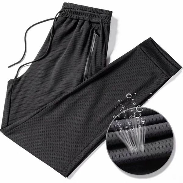 

men's sports hollow summer thin loose air conditioning nine-point ice silk mesh track straight pants 201110, Black