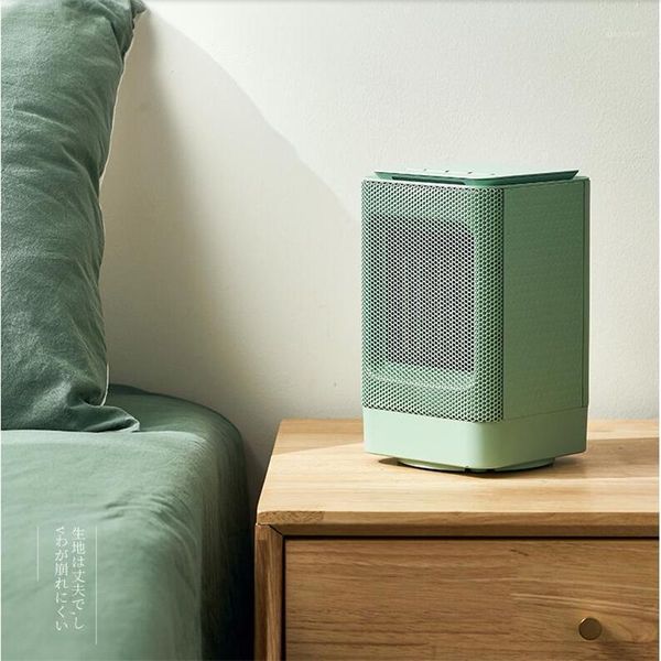 

220v mini electric fan heater household portable electric heater fast heating for travel office1