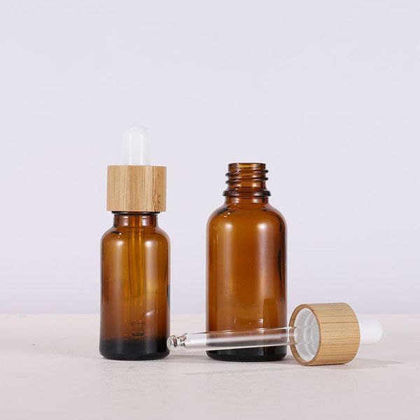 

5ml 10ml 15ml 20ml 30ml 50ml 100ml amber glass essential oil cosmetic dropper bottles with eye dropper and bamboo cap