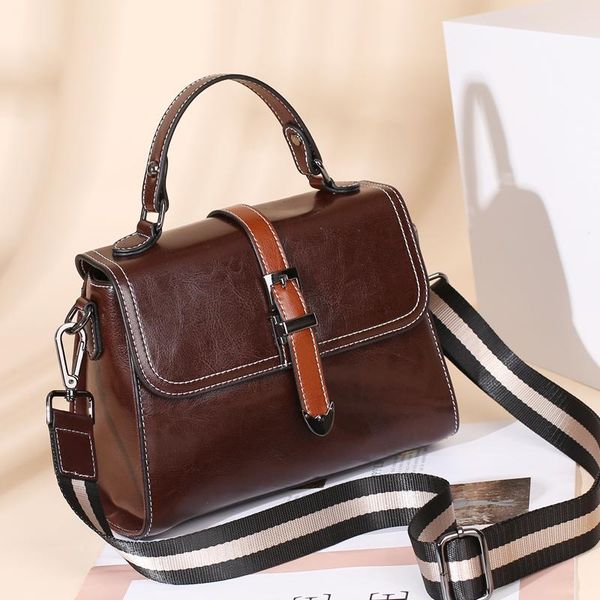 

2021 summer luxury leather fashion women diagonal cross bag large capacity multifunctional high texture black women's small bag
