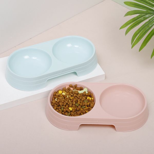 

2020 new candy-colored plastic pet cat bowl fashion ins wind macarons color double oval pet bowl