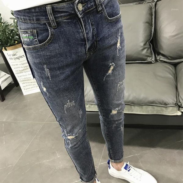 

street teenagers washed blue ripped hole scratches denim trousers male summer new feet wild korean style pencil pants1