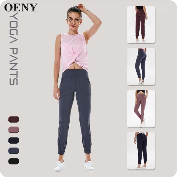 

yoga outfits casual pocket pants women sports nine-point solid color running gym fashion fitness trousers1, White;red
