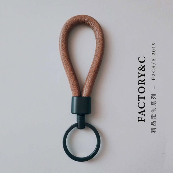 

simple and customized genuine handmade creative hand holding car leather key pendant chain ring, Silver