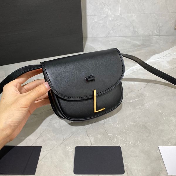 

rounded and compact summer 2020 looks simple graceful bag 623097 minimalist and smooth vegetable tanned calfskin bags small round appearance