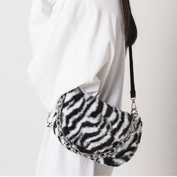 

cross body in autumn and winter of 2021, the zebra pattern plush shoulder diagonal bag wild fairy armpit fashion chain woman