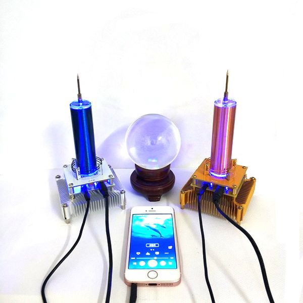 

tesla coil put music ion windmill wreath spaced lights wireless transmission radio station q0113