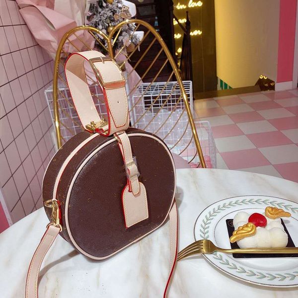 

round bag new female 2020 presbyopic genuine leather handbag women shoulder bags worn round cakes packages