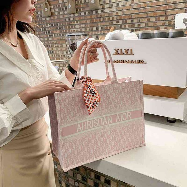 

2022 factory wholesale new fashion versatile portable one shoulder tote canvas shopping bag