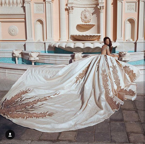 

dubai arabic vintage wedding dresses said mhamad long sleeve gold lace applique sequins plus size wedding dress with cathedral train, White