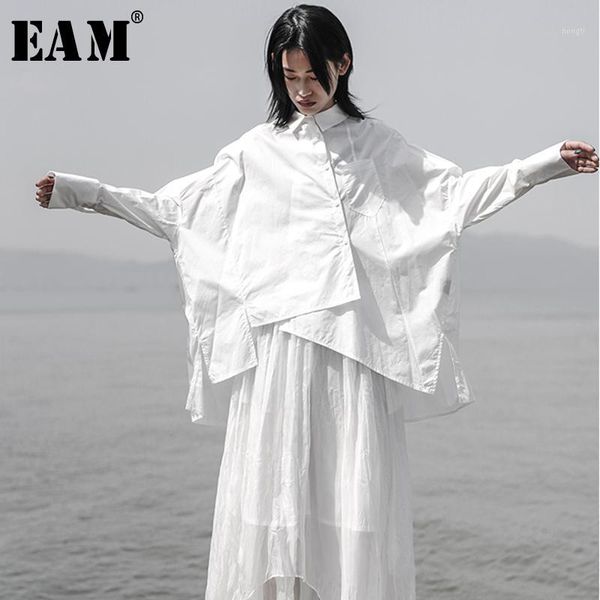 

eam] 2019 new autumn winter lapel long sleeve white loose oversize irregular loose shirt women blouse fashion tide js9211