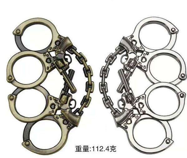 

defense tool hand metal skull buckle iron buckle four finger gloves tiger ring self defense support children pistol boxing 674155