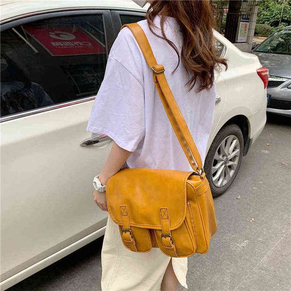 

nxy handbag women men vintage yellow preppy large satchels students messenger bags oiled soft leather wide strap crossbody shoulder 0208