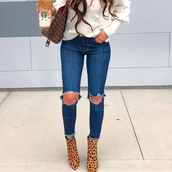 

fall / winter 2020 new button tassel pierced elastic jeans women's wear, Blue