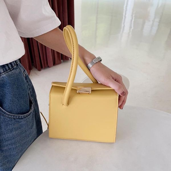 

new simple women's handbag small fashion solid color pu hand carry women's bag single shoulder straddle bag korean cow leather