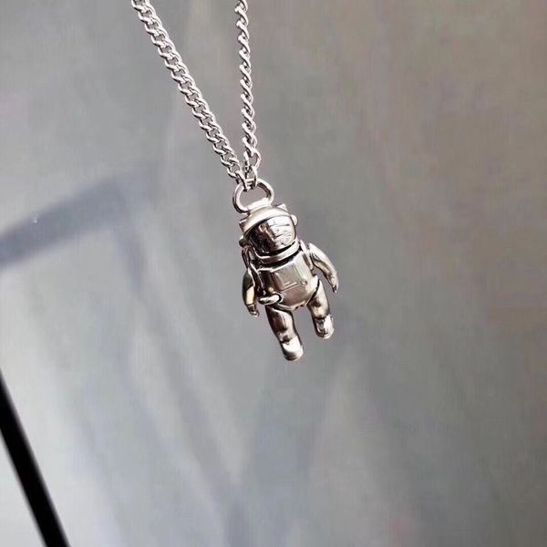 

the astronaut stainless steel silver necklace is a must-have for an engagement