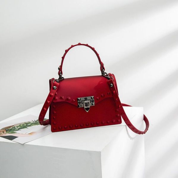 

the new women's one-shoulder cross bag is fashionable and versatile with matte rivet jelly bag and portable square for women