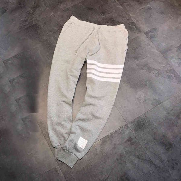 

spring summer fashion waffle yarn dyed striped casual loose legged pants for men and women, White;black