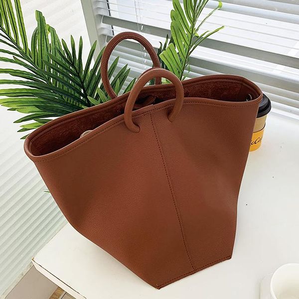 

cross body ladies large-capacity retro bucket bag niche design female handbag pu leather solid color messenger and shoulder
