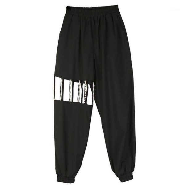 

2020 spring and summer new niche design pearl hollow beam leg casual pants female wild black trousers1, Black;white