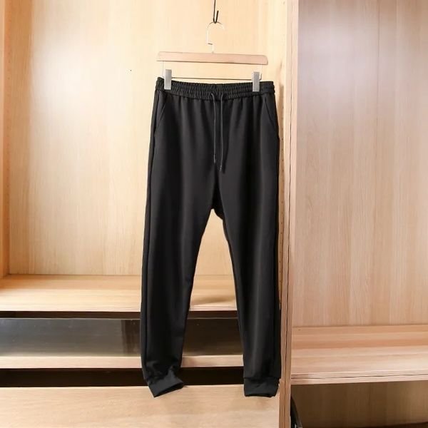 

ajian independent domestic company single spring and summer elastic basic band mouth casual men's pants