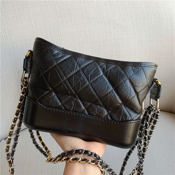 

new head leather small fragrance lingge chain vagrant bag, fashionable and versatile, single shoulder cross arm women's bag