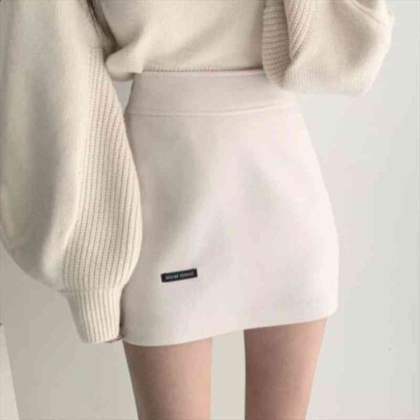 

korean version of pure color wild high waist bag hip skirt a-line skirt woolen short tide, Black