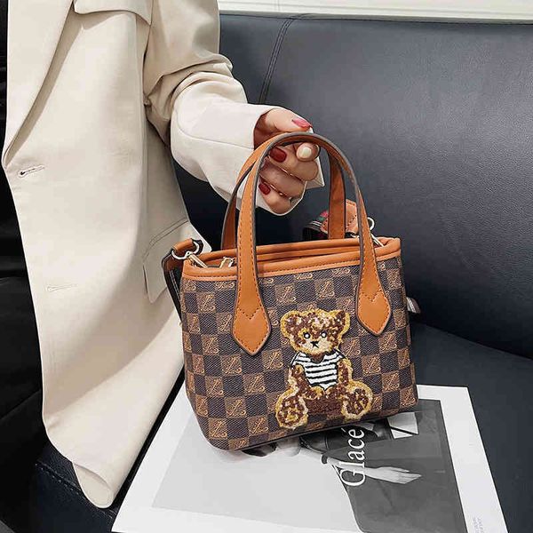 

2022 factory wholesale new pop bbao texture bag female french minority single shoulder messenger bag old cauliflower basket children's