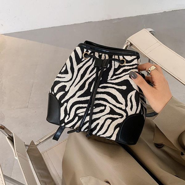 

2020 new women's shoulder bag casual messenger bag striped velvet bucket sling fashion phone purse