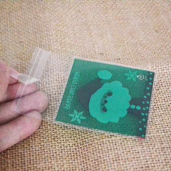 

50 100pcs cookie gift bags christmas santa claus snowman snacks cookie plastic packaging bags party wedding candy bag kids favor wmtply