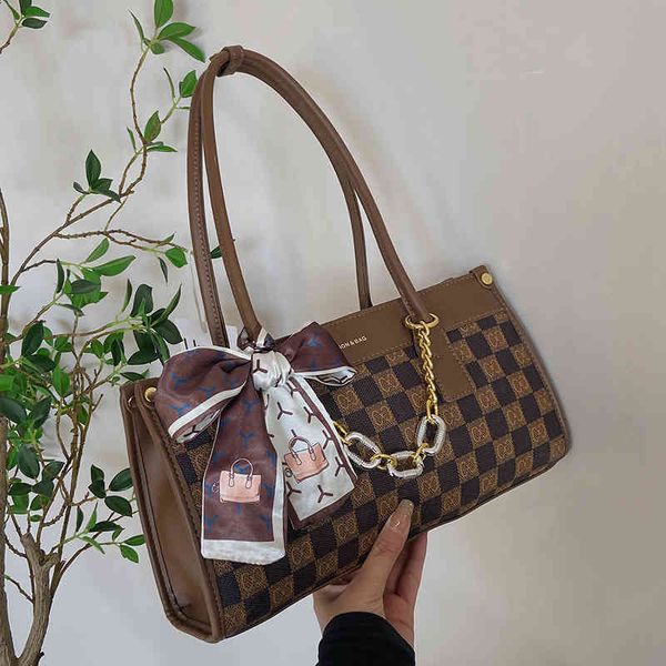 

2022 factory wholesale new bag female spring new bags fashion checkerboard hand simple underarm single shoulder