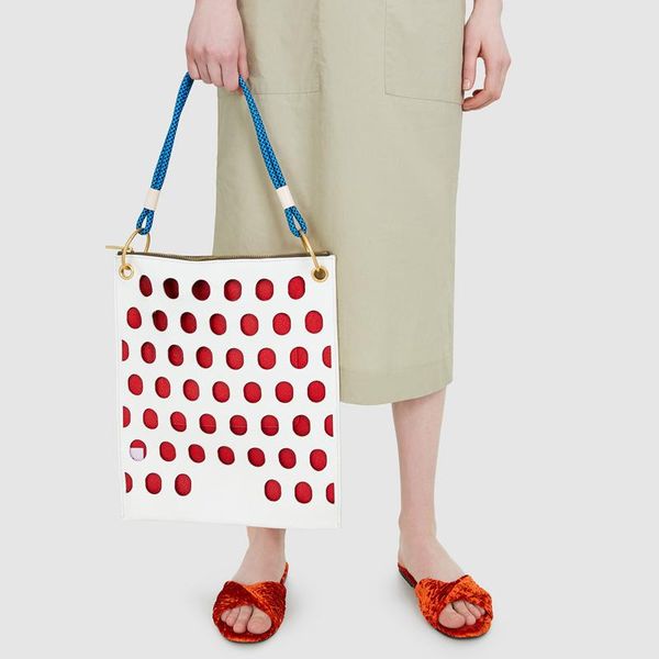 

spain niche design byla handbag 2020 new personality dot hollow hollow color hand shoulder bag