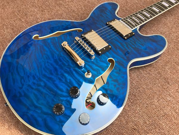 

blue jazz electric guitar double quilted maple gold hardware2639