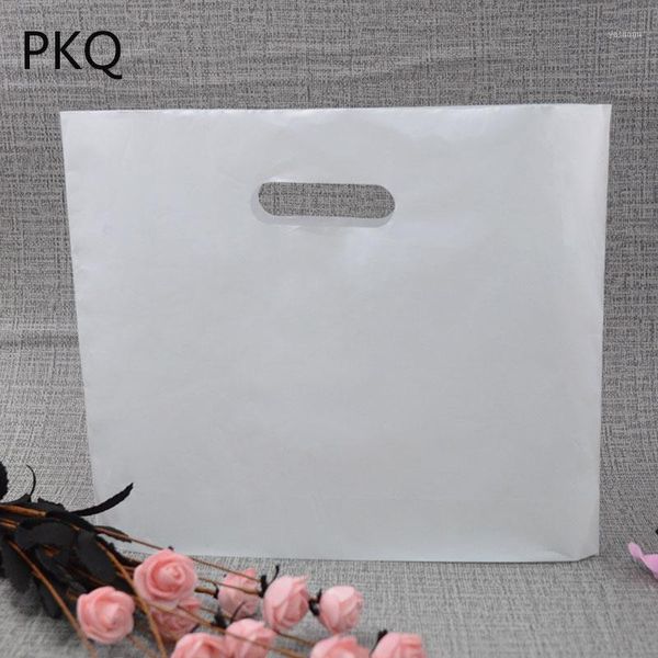 

100pcs large plastic gift bags with handles small bags for shops jewelry candy wedding favors birthday party decoration bag1