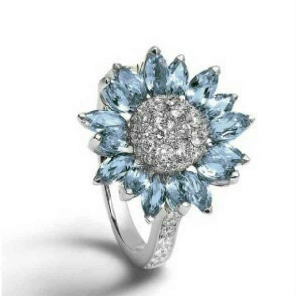 

rings sunflower ring inlaid with light blue zircon, Silver