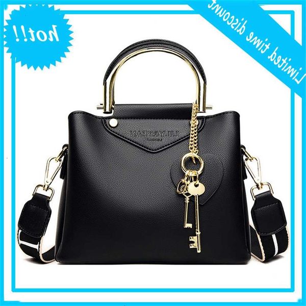 

double strap straddle single shoulder 2021 texture iron handle handbag small bucket women's bag send concentric lock pendant
