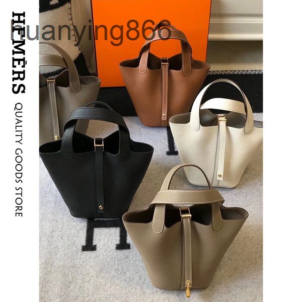 

designer h andbags bag 2022 new family first layer kraft vegetable basket women's leather portable bucket litchi pattern graffiti