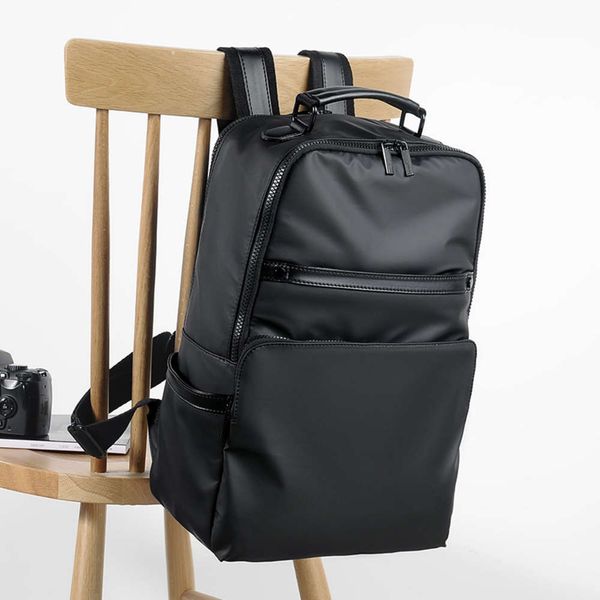 

new men's large capacity comter fashion leisure waterproof wear ristant nylon cloth trend school