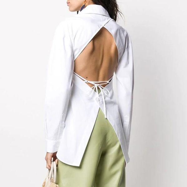 

7.6 2020 summer women's new chic cropped hollow out backless lace-up solid color design cotton long sleeve white blouse1