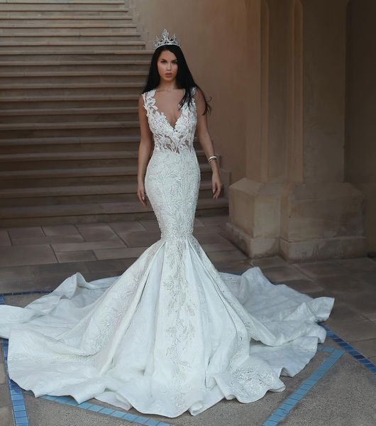 

gorgeous mermaid wedding dresses sleeveless beads lace appliques backless v neck glamorous dubai lace sweep train bridal gowns, White